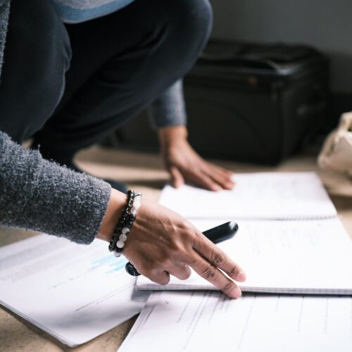 woman reviewing notes for a pregnancy centering class