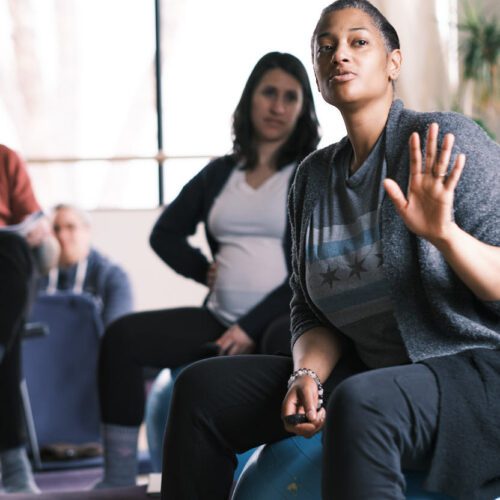 pregnancy centering group teacher speaking in class